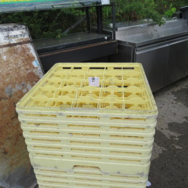 Deep yellow dishwasher rack with 25 holes, labeled 3XBID, in used condition. Suitable for commercial use.