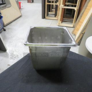 1/6 size 6-inch deep hotel pan in metal, good condition, ideal for catering use; no visible markings or labels.