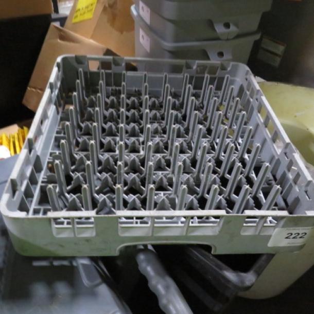 Gray dishwasher rack with vertical prongs, in used condition. Number "222" on the side. Sturdy and functional design.