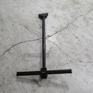 Black metal TV mount with adjustable height, good condition. Brand "Monster" marking. Suitable for flat-panel TVs.