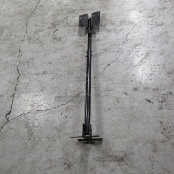 Metal TV mount, adjustable, black finish, sturdy steel construction, mounting brackets visible, used condition.