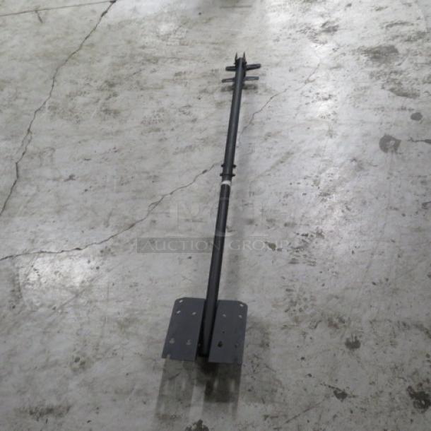 Metal TV mount, sturdy construction, long bar with two mounting plates, suitable for secure wall installation.