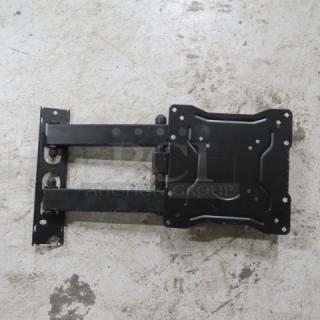 Black metal TV mount with adjustable arms and wall brackets, in good condition, designed for flat-screen installation.