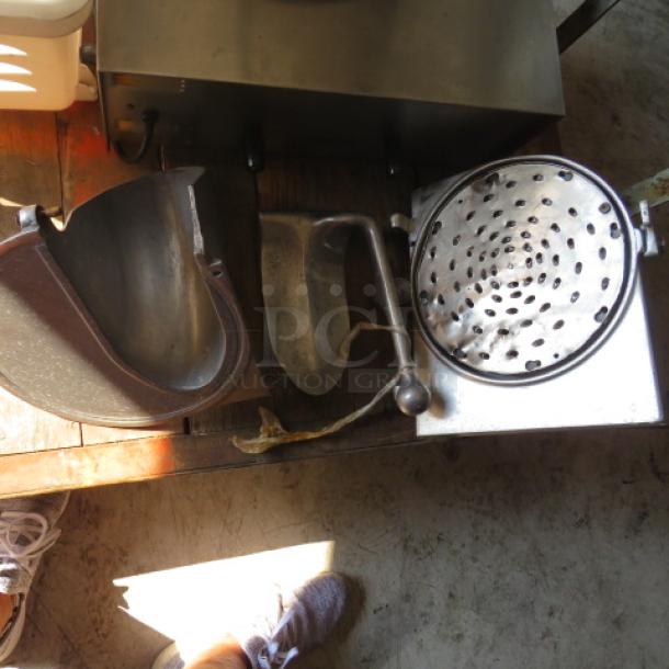 Cracked Pelican head for parts only, visible metal components, worn condition.