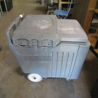 One Winco Poly Ice Transport With Drain On Casters. - Item #1203523