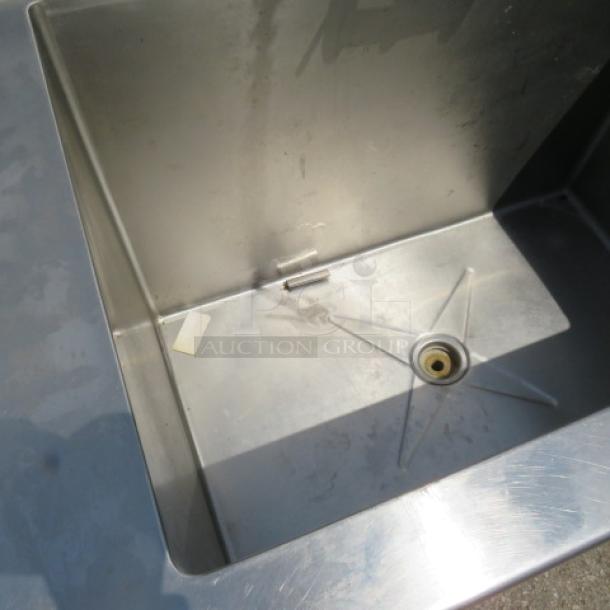Stainless steel single-compartment sink with faucet, hose sprayer, and right-side drain table. Dimensions: 42x24x28 inches.