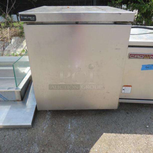 Delfield GUF27P-S 1 Door Freezer, includes 1 rack, on casters. Dimensions: 27x30x33 inches. 115 Volt.