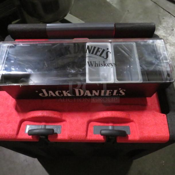 Jack Daniels domed bar center with logo, featuring multiple compartments. Excellent condition.