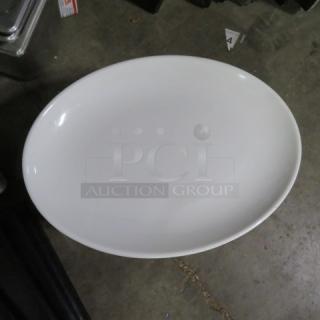 14x10 white oval melamine platter, durable and scratch-resistant, excellent condition, plain design, ideal for serving.