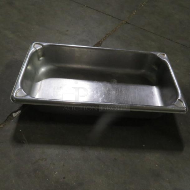 1/3 size 2.5 inch hotel pan, stainless steel, gently used, suitable for commercial kitchen use.