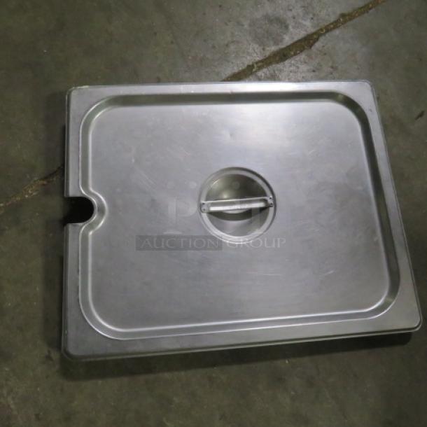 1/2 Size Hotel Pan Lid, metal, with handle, model 4XBID, good condition.