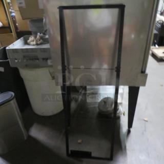 Black metal sign frame, 17x50 inches, in used condition. No visible markings. Sturdy construction for signage display.