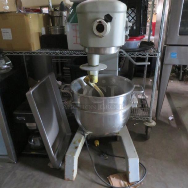 Hobart D-300 30 Quart Stand Mixer with bowl and hook. 115 Volt, in working condition. Mixer with visible wear.