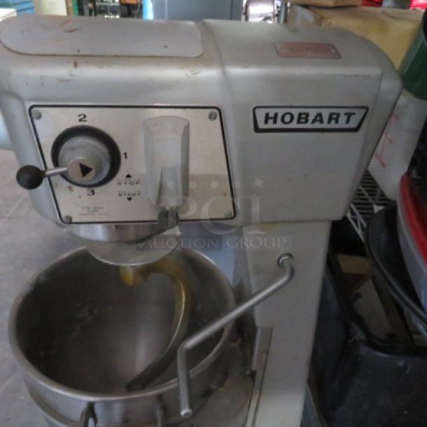Hobart D-300 30 Quart Stand Mixer with bowl and hook, 115V, used; logo and controls visible, sturdy metal build.