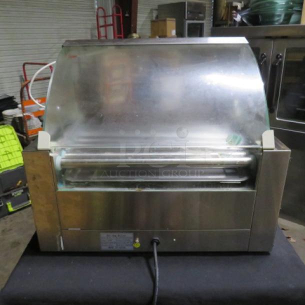 Rovsun NB-XCJ-G-7 hot dog roller, stainless steel, 110V, dimensions 22.5x13x20, protective cover, used condition.