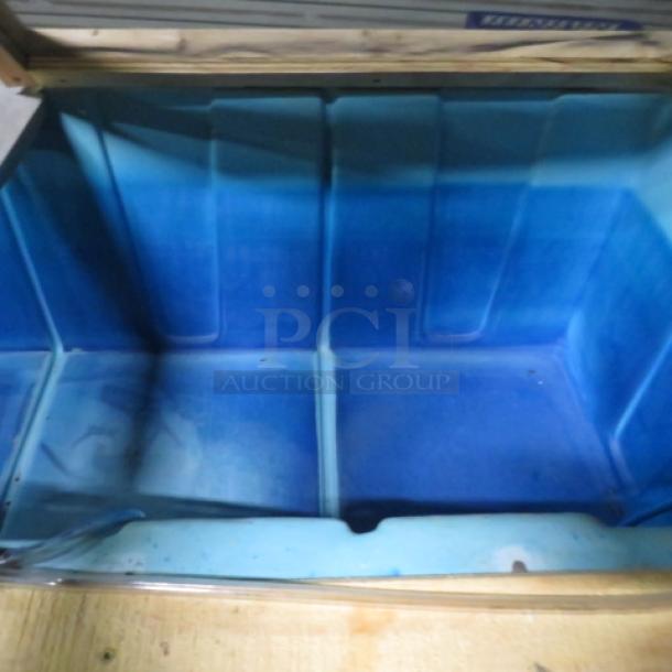 Large blue live bait box, 77x36x34, in good condition. Interior features bright blue lining. No visible labels or markings.