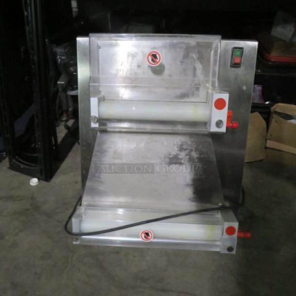 Avesta APD40 pizza dough roller, 110V, stainless steel, dual rollers, excellent condition, labeled with safety warnings.