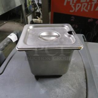 1/6 size 6-inch deep hotel pan with lid, stainless steel, light wear, ideal for commercial kitchen use.