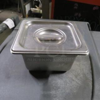 1/6 Size 4 Inch Deep Hotel Pan with Lid, stainless steel, used condition, model 3XBID, durable and versatile.
