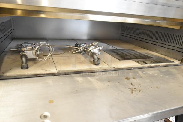 Marsal SD448 stainless steel commercial pizza oven interior with natural gas components and cooking stones visible.