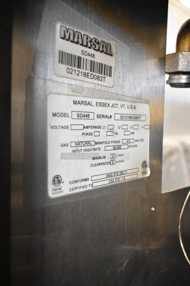 Marsal SD448 label showing model, 95,000 BTU, natural gas input, and certification details on stainless steel pizza oven.
