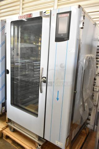 Brand new Blodgett BCT-202 stainless steel commercial combi oven, view-through door, metal pan rack, minor scratches.