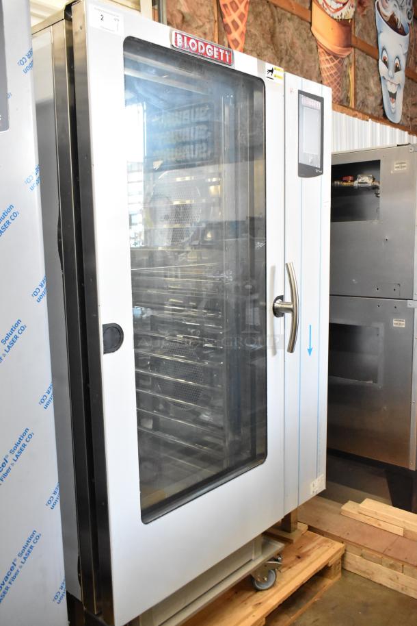 Brand new Blodgett BCT-202 stainless steel commercial electric convection oven, view-through door, metal pan rack, scratch and dent.