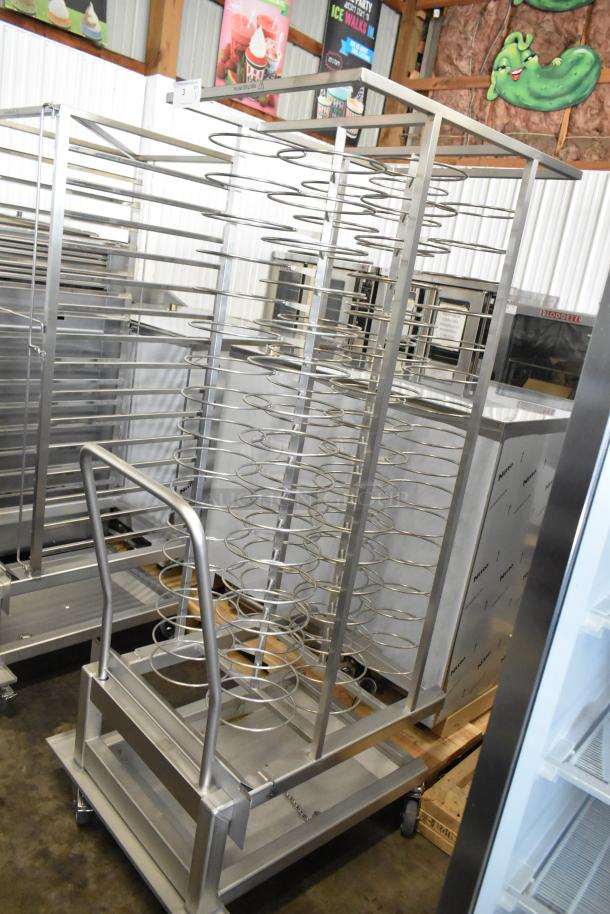 BRAND NEW Blodgett metal portable rack for combi convection ovens, stainless steel, slight cosmetic dent, on casters for mobility.