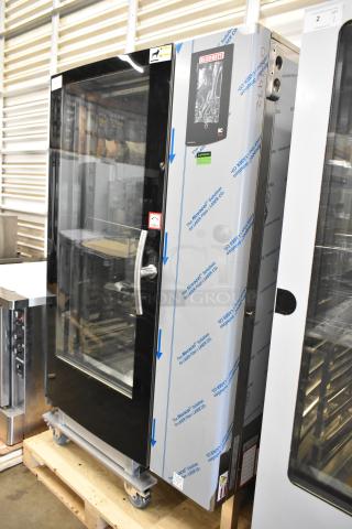 Brand new Blodgett BCT-202 stainless steel electric convection oven with view-through door on a metal transport rack.