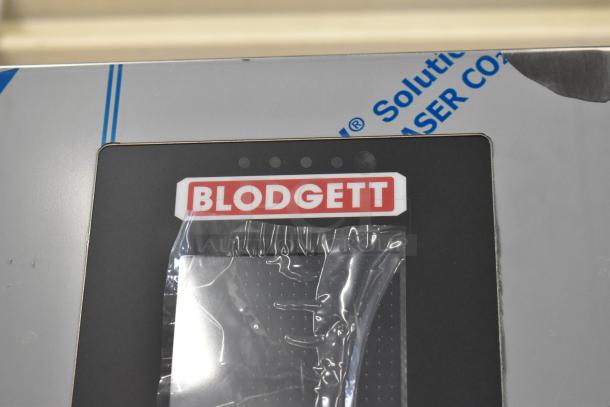 Brand new Blodgett BCT-202 stainless steel combi convection oven, electric powered, with protective film and Blodgett logo.