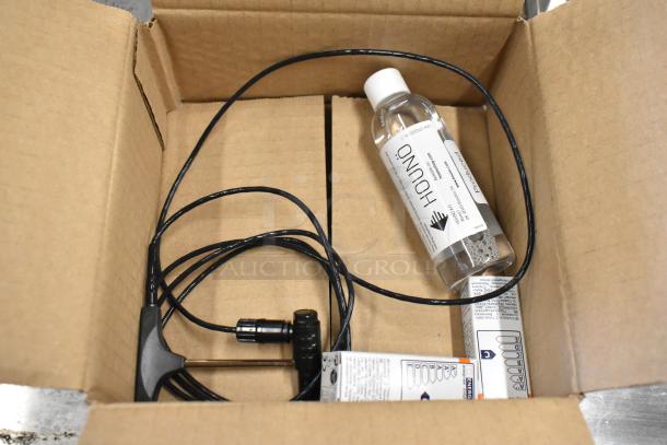Box containing Hound cleaning solution and cables. No visible damage. Ideal for Blodgett BCT-202 oven maintenance.