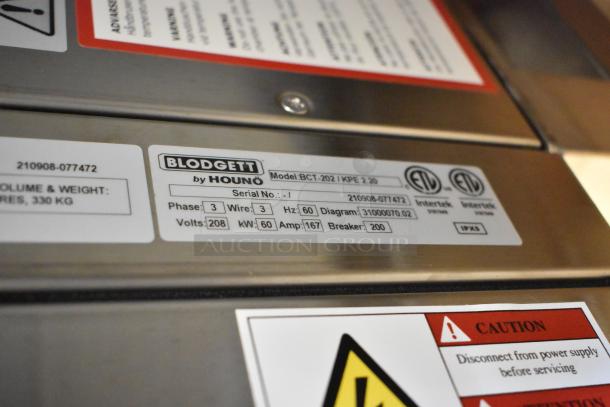 Close-up of Blodgett BCT-202/KPE 2.20 oven label, showing electrical specs: 208V, 3-phase, 60Hz. Serial No. 210908-077472.
