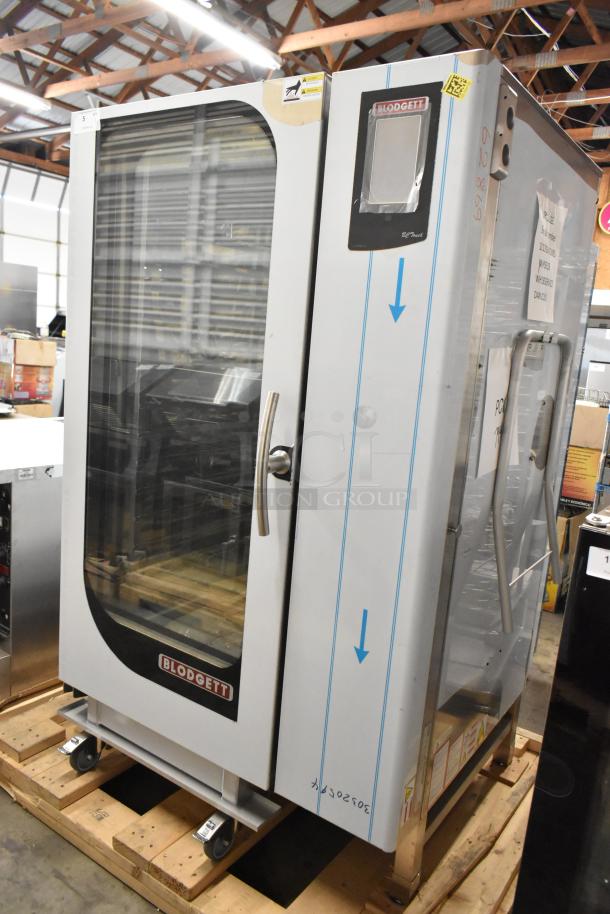 Brand new Blodgett BLCT-202/CPE stainless steel commercial electric convection oven with view-through door and metal pan rack.
