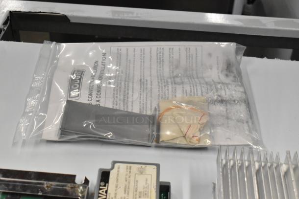 Plastic bag containing Blodgett BLCT-6E-H oven manual and components, showing brand logo and instructions.