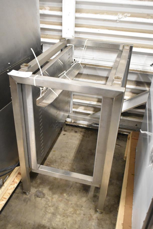 Brand new metal commercial pan rack with minor scratches and dents, sturdy stainless steel, adjustable shelves, ideal for kitchen use.