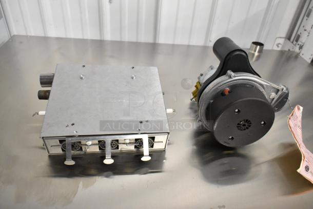 Metal components for Blodgett BLCT 102/CPE-gas convection oven, displayed on a stainless steel surface.