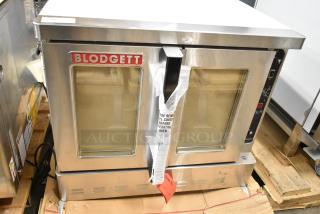 BRAND NEW Blodgett DFG100 stainless steel convection oven with view-through doors, metal racks, and thermostatic controls.