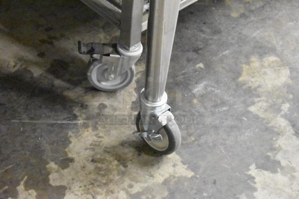 Brand new Blodgett Zephaire-100-G oven wheel on commercial caster, stainless steel legs, and floor surface.