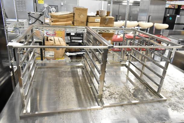 2 Blodgett metal racks, scratch and dent condition, stainless steel, open frame design, on a steel countertop.