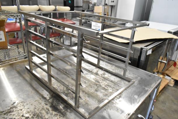 Brand new Blodgett metal rack, scratch and dent condition, sturdy construction, ideal for commercial use.