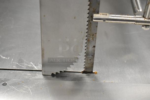 Brand new Avantco EMBS94SS 94" stainless steel vertical band meat saw blade. 220V, 3-phase. Small scratches visible.