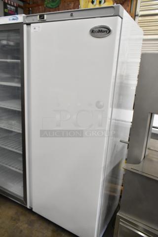 KoolMore KM-RIC-1DWH commercial one-door refrigerator/freezer, 25 Cu. Ft., new with scratches and dents, model tag visible.