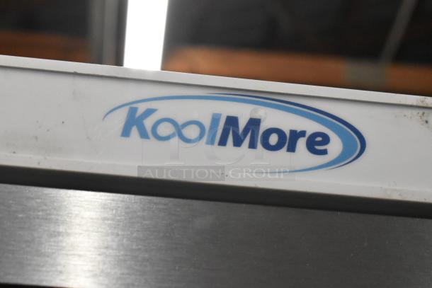 KoolMore KM-FMD20WGD commercial freezer, 21 Cu. Ft., glass door, 115V, scratch and dent condition, logo visible.