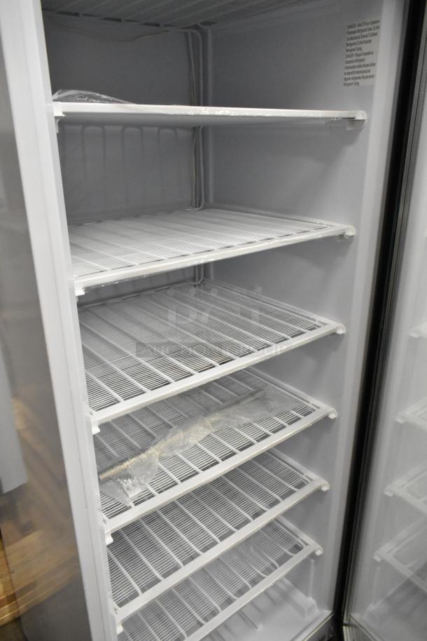 BRAND NEW KoolMore KM-FMD20WGD 21 Cu. Ft. Commercial Freezer, glass door, shelves visible, 115V, 1 phase, interior label.