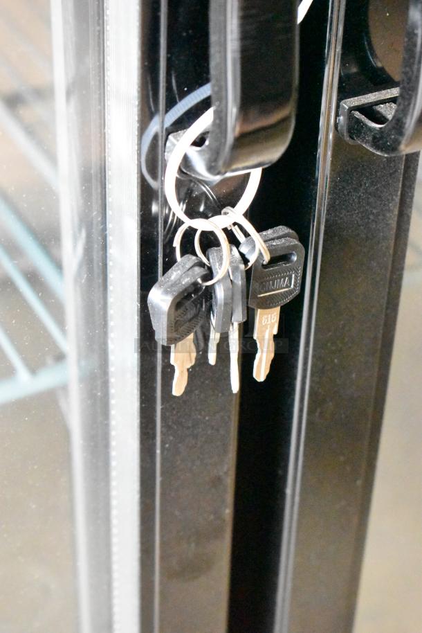 "Brand new Avantco 178UBB72GHC back bar refrigerator, 73-inch, narrow glass doors, LED lighting, minor scratches, with keys."