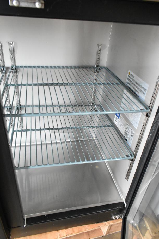 BRAND NEW Avantco 178UBB72GHC 73" black glass door back bar refrigerator, LED lighting, minor scratches, labels visible inside.
