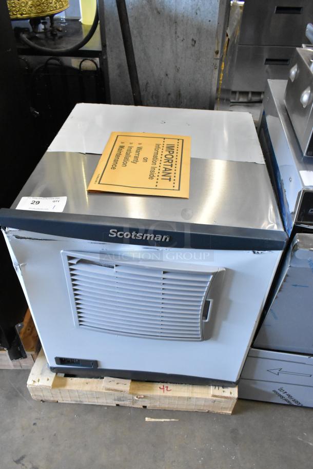 Brand new Scotsman FS0522A-1B flake ice machine, 22" air-cooled, 450 lb capacity, scratch and dent, info packet on top.