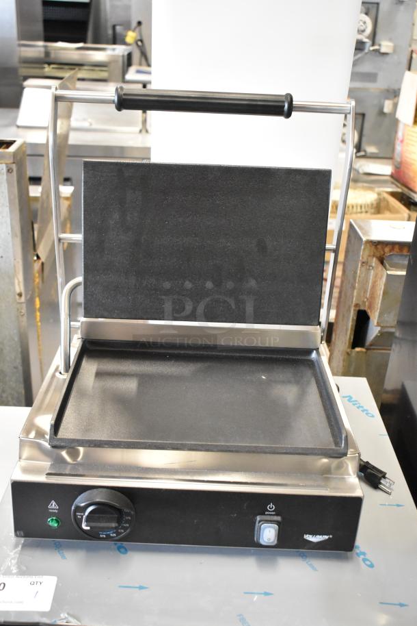Brand new Vollrath TSI7011 panini grill, smooth cast iron plates, 13.5" x 9.25" surface, 120V, with control knob.