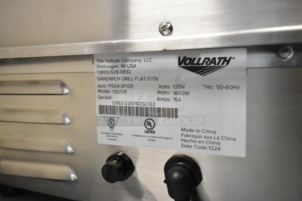 Alt text: Close-up of label on Vollrath TSI7011 Panini Grill, showing model, voltage, wattage, and certifications.
