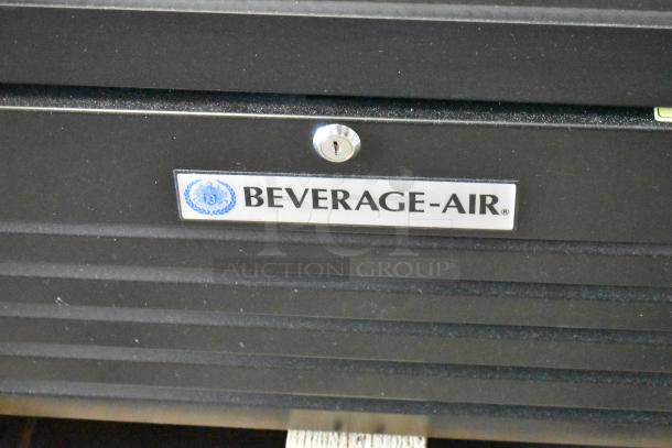 BRAND NEW Beverage Air MT12-1 25" black refrigerated merchandiser, left hinged glass door, LED lighting, 115V, minor dents.